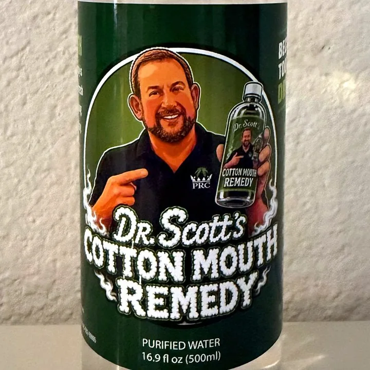 Front of a Dr. Scott's Cotton Mouth Remedy bottle, 16.9 fl oz purified water